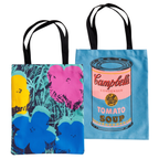 Two canvas tote bags with colorful pop art designs by Andy Warhol on a white background