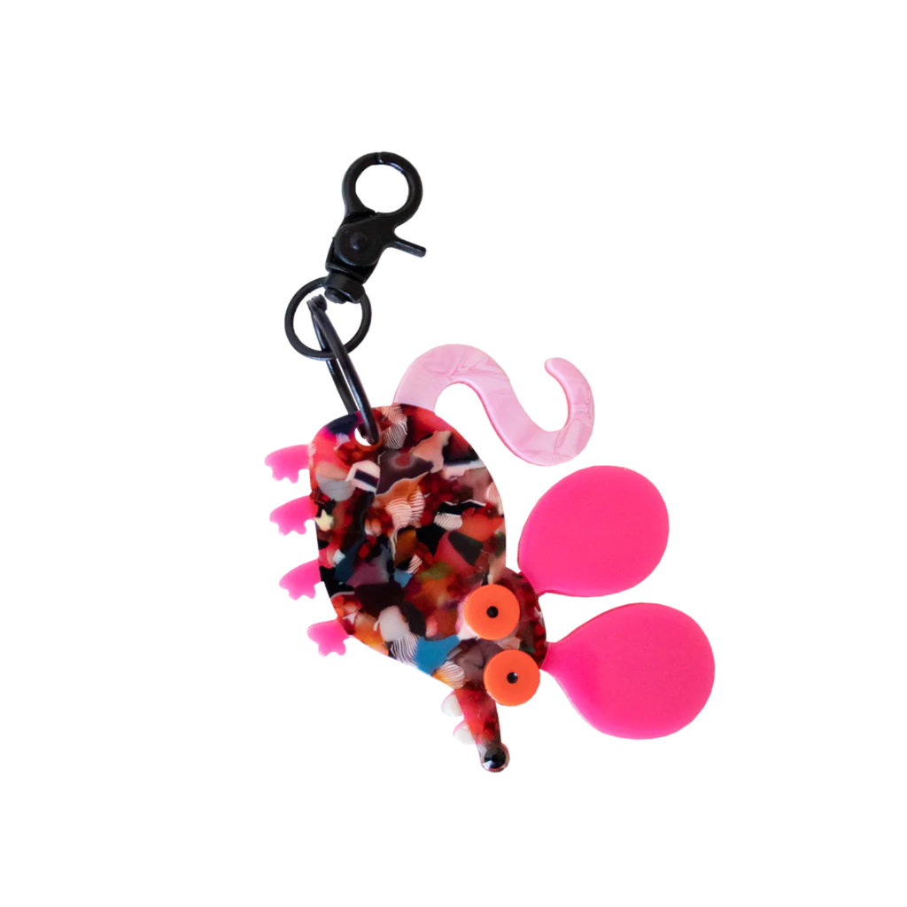 Colorful rat keychain with a multicolored body and pink accents on a white background