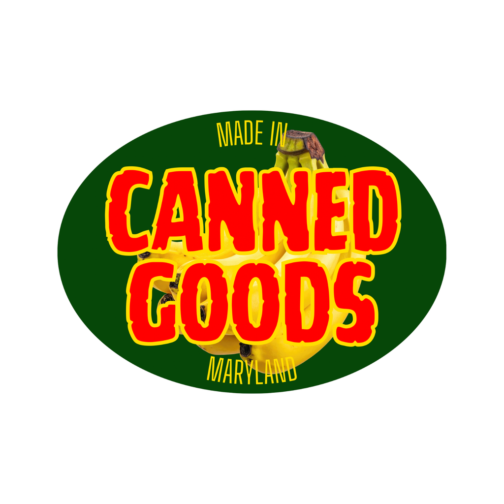 Oval sticker with 'Canned Goods' and 'Made in Maryland' text and images of bananas on a green background