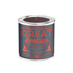 Candle with a label of Great Smokies paint with red and white text on a blue background