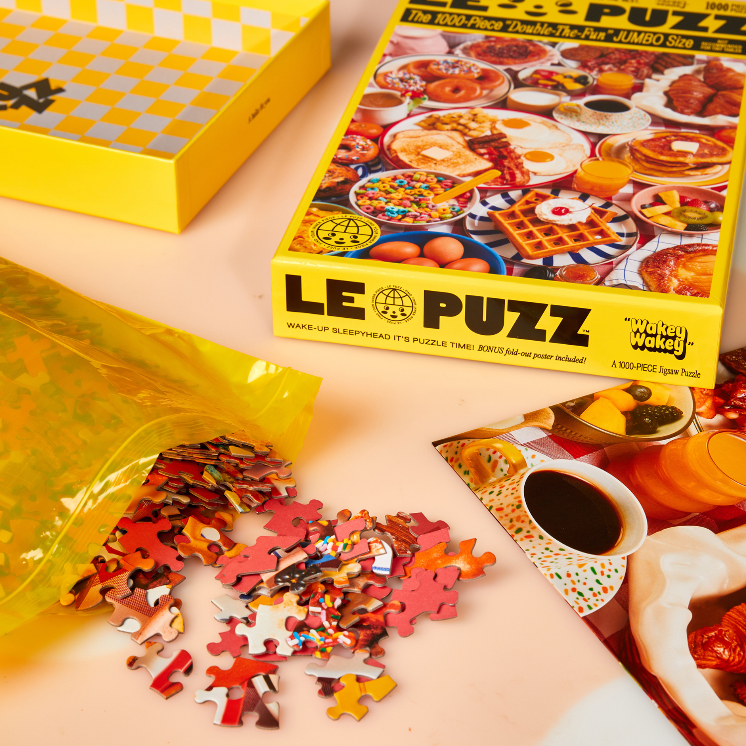 LE PUZZ puzzle box with scattered pieces on a light surface