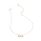 A delicate gold chain bracelet featuring a small gold crab pendant, displayed on a clean white background.