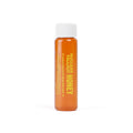 Small bottle of Nuclear Fallout Radioactive honey with a white cap on a white background