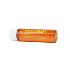Small bottle of Nuclear Fallout Wildflower Honey on a white background