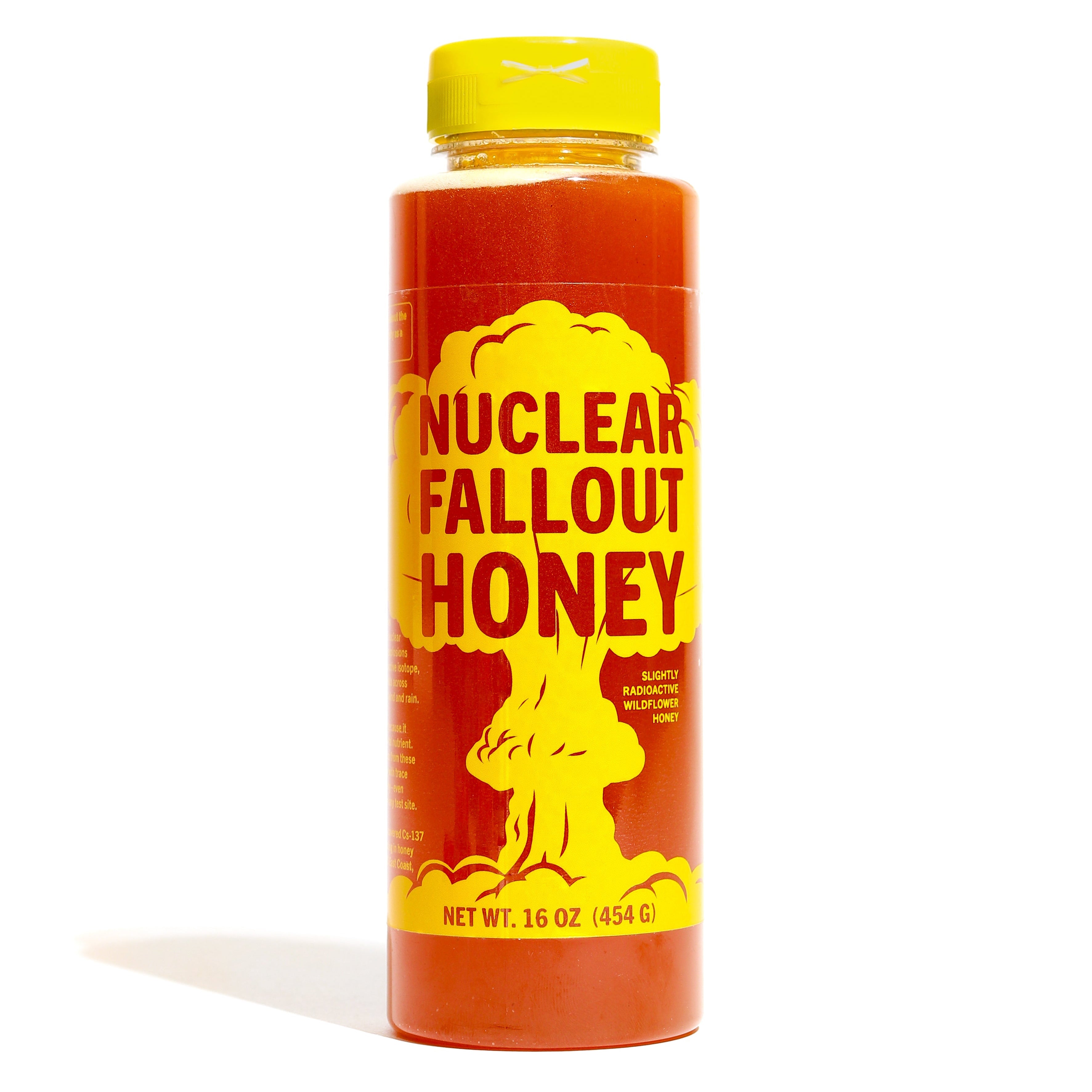 Bottle of 'Nuclear Fallout Honey' with a yellow label on a white background