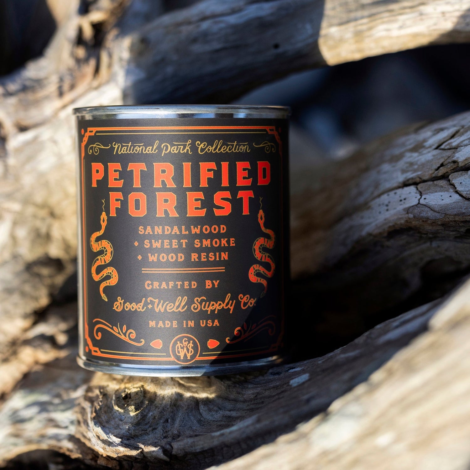 Petrified Forest candle in National Park Collection on a wooden surface
