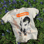Trainspotting t-shirt with movie poster design on grass with flowers
