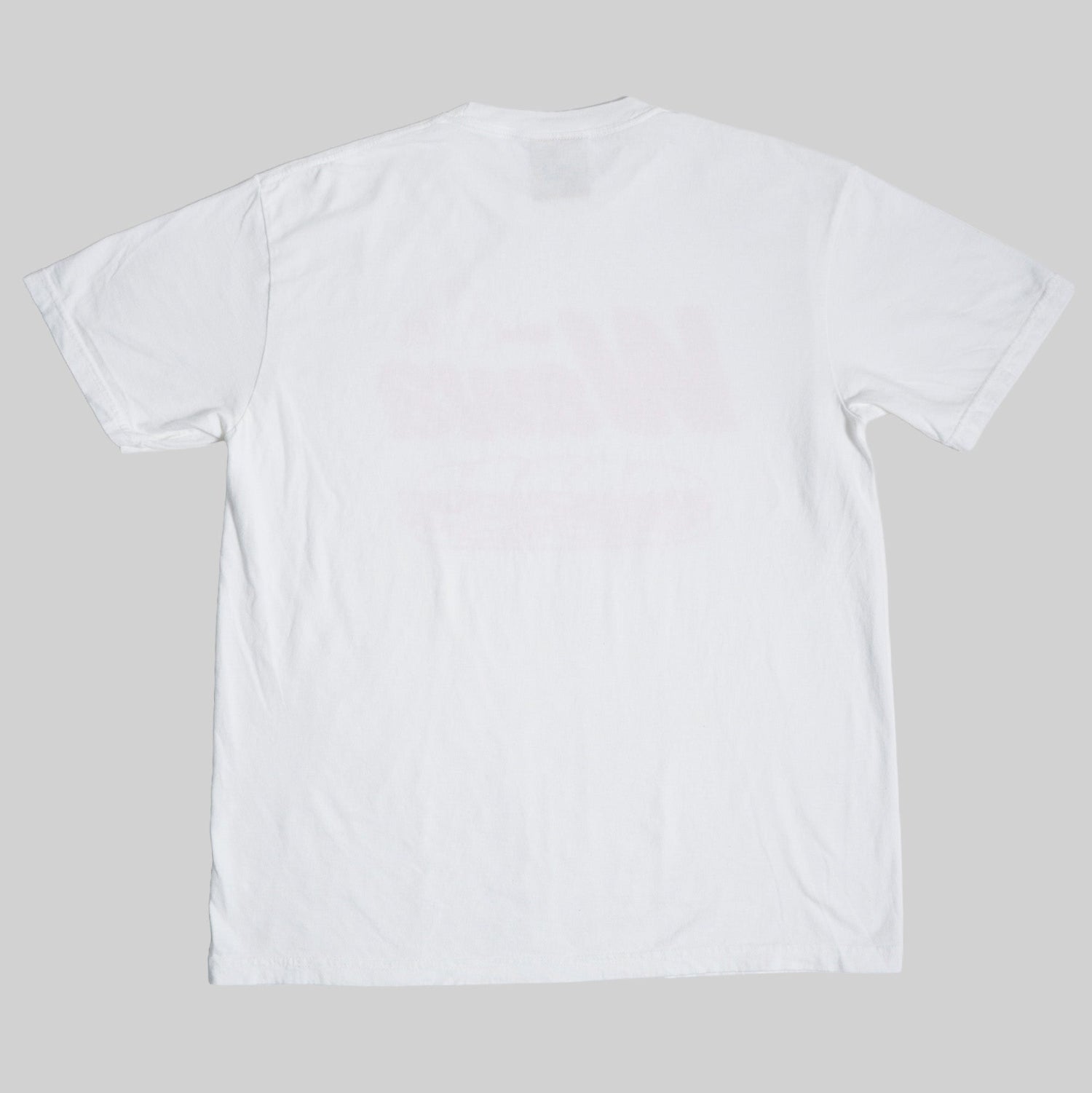 Back of White t-shirt on a light gray background