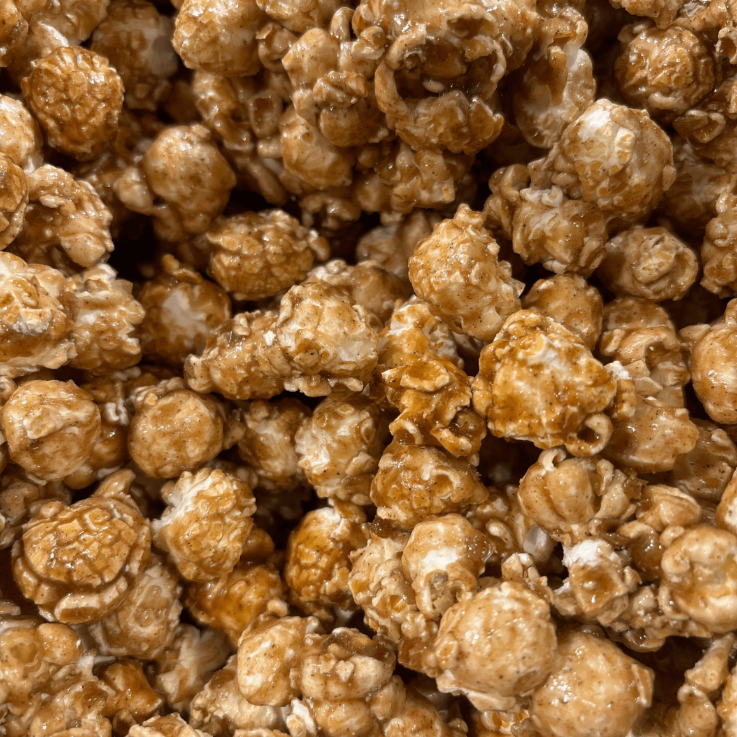Close-up of caramel popcorn with a brown color.